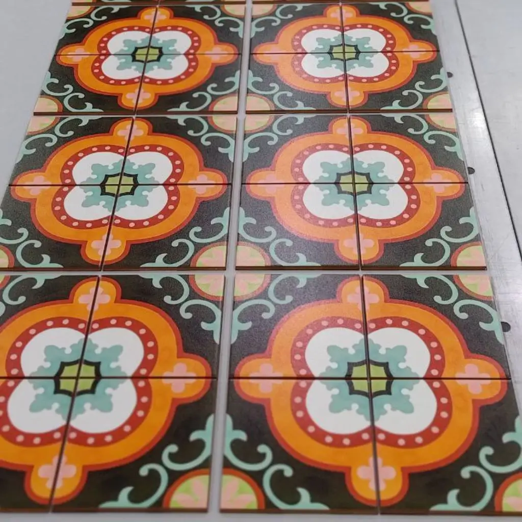 Vibrant floral patterns displayed on square tiles using precision ceramic tile printing.